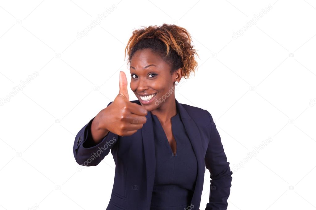 African American business woman making thumbs up gesture - Black