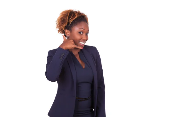 Mujer de negocios afroamericana haciendo una señal de llamada telefónica con h —  Fotos de Stock