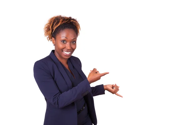 Mujer de negocios afroamericana señalando algo —  Fotos de Stock