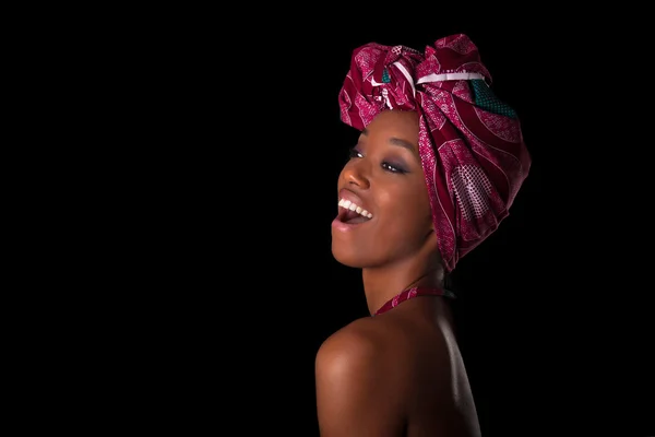 Young beautiful african woman wearing a traditional headscarf, I — Stock Photo, Image