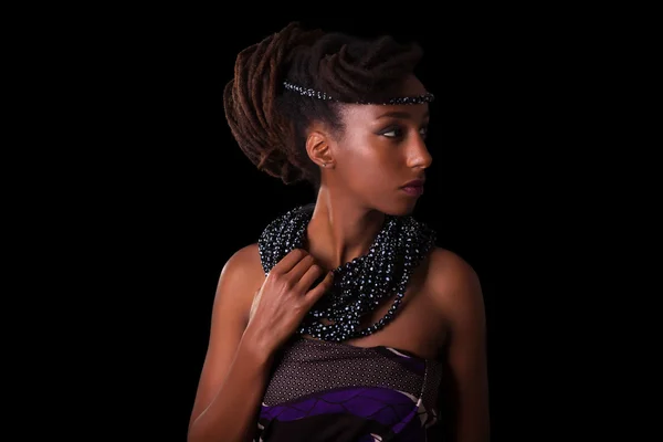 Young beautiful african woman wearing  traditional jewelry, Isol — Stock Photo, Image