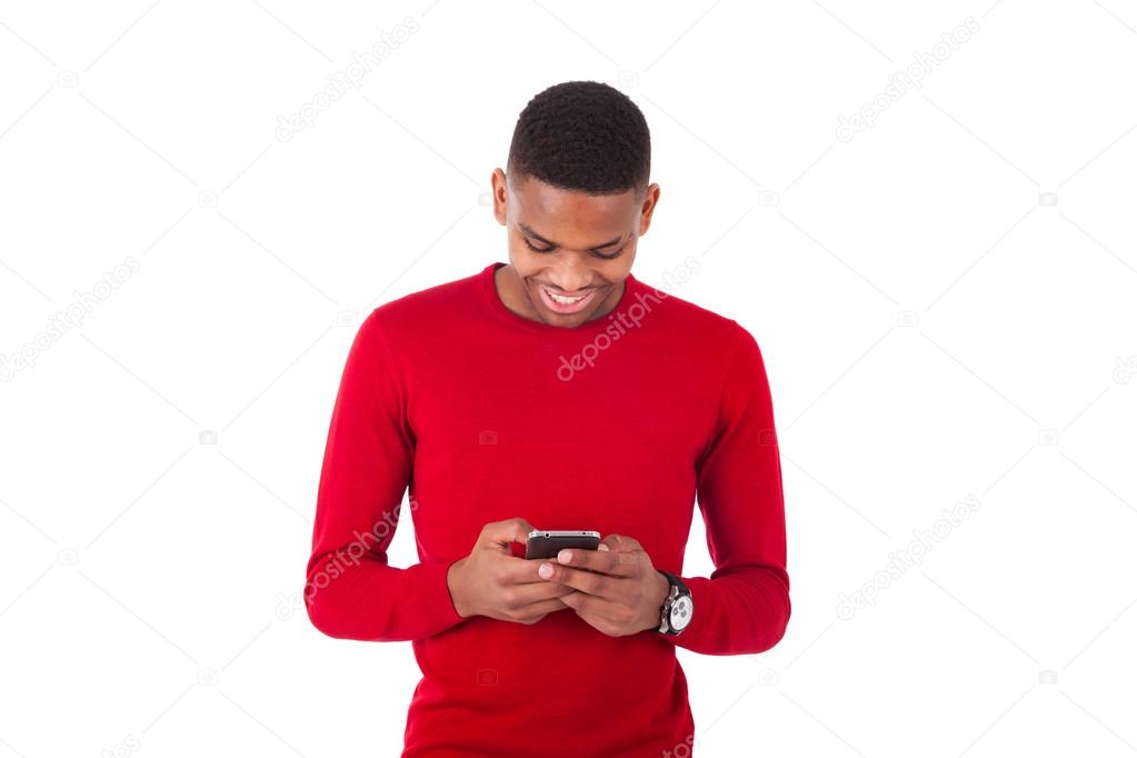 African American young man sending a text message on her smartph