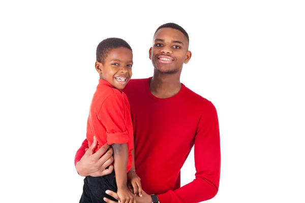 African American man with holding  his little boy isolated on wh — Stock Photo, Image