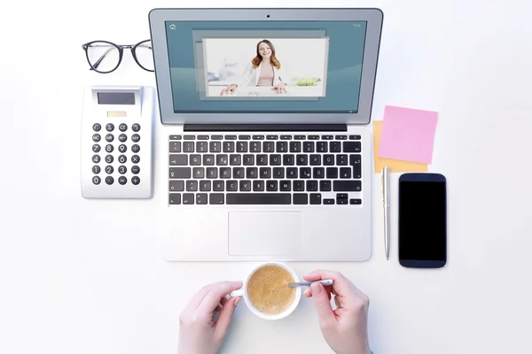 Woman having video chat at office — Stockfoto