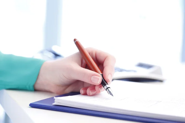 Businesswoman sign the contract Stock Photo