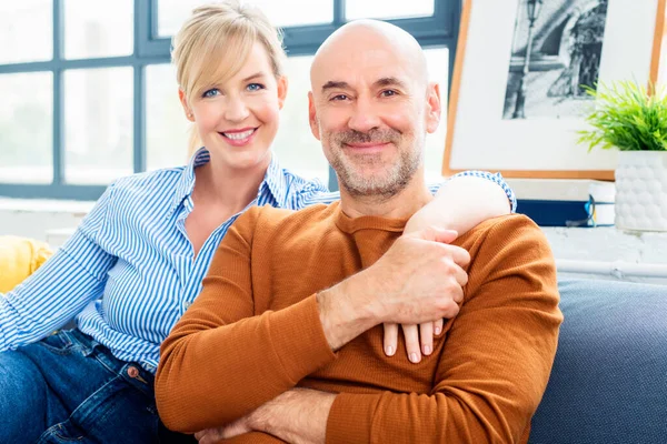 Shot Happy Couple Sitting Couch Home Bonding Each Other While — Stock Photo, Image