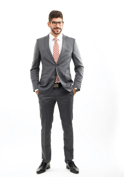 Hombre de negocios guapo de pie sobre blanco —  Fotos de Stock