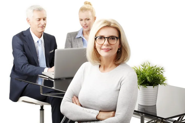 Attractive businesswoman with colegas — Stock Photo, Image