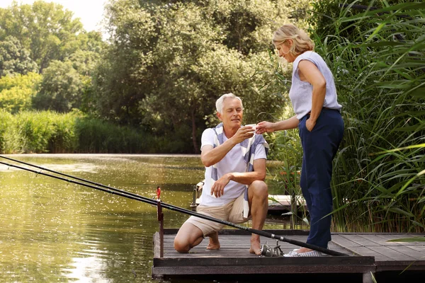 Happy old age couple fishing — Stock Photo, Image