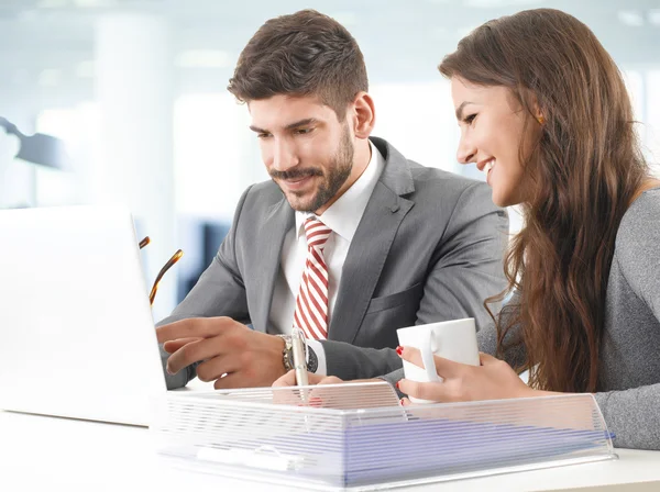 two young professionals consulting