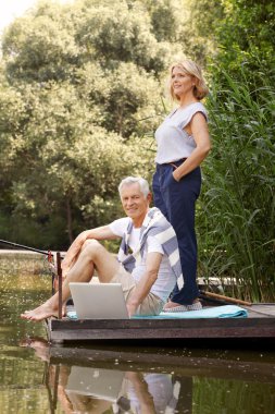 Seniors and the lakeside  fishing