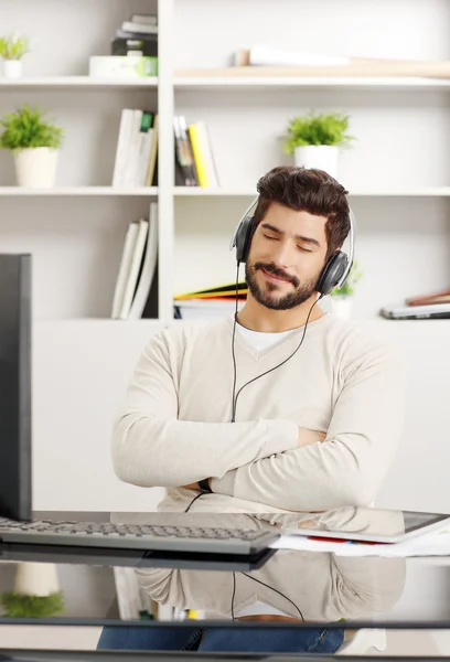 Dreamy professional with headphone — Stock Photo, Image