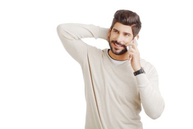 İş adamı cep telefonuyla konuşuyor