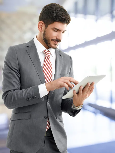 Young broker  holding digital tablet — Stock Photo, Image