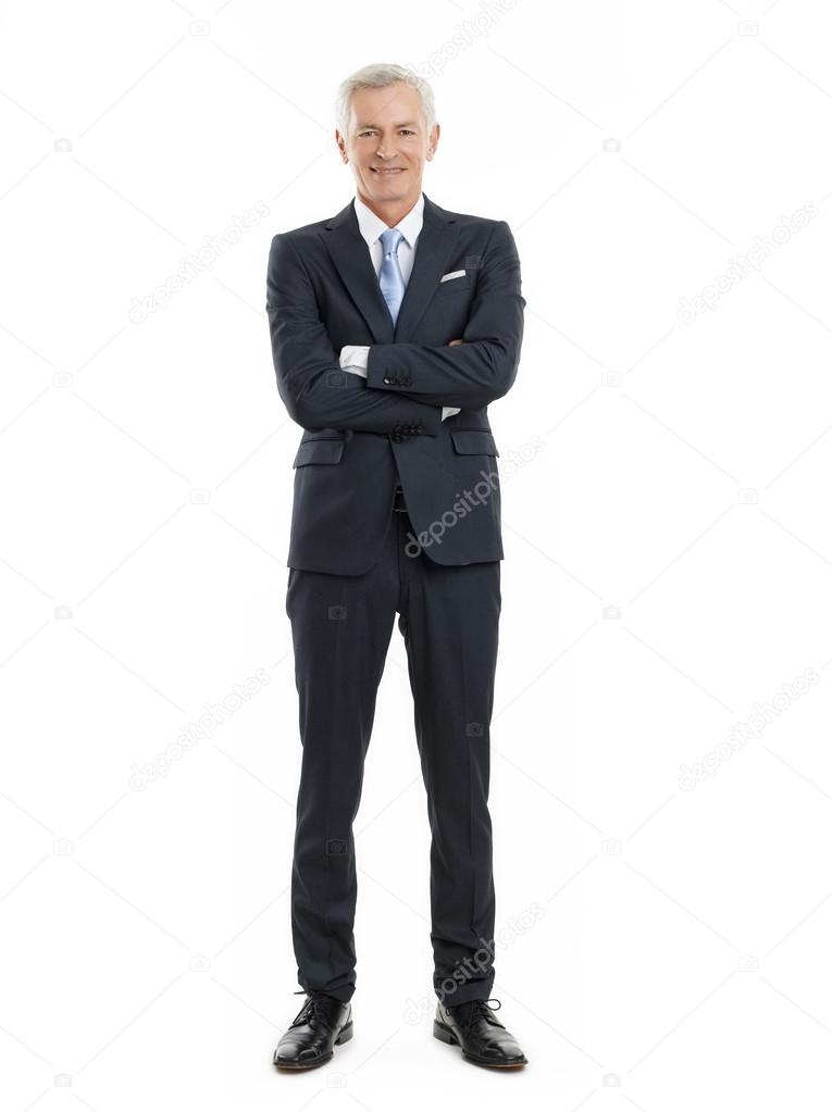 Senior businessman with arms crossed