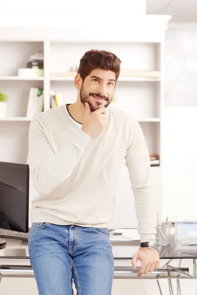 Young businessman thinking — Stock Photo, Image