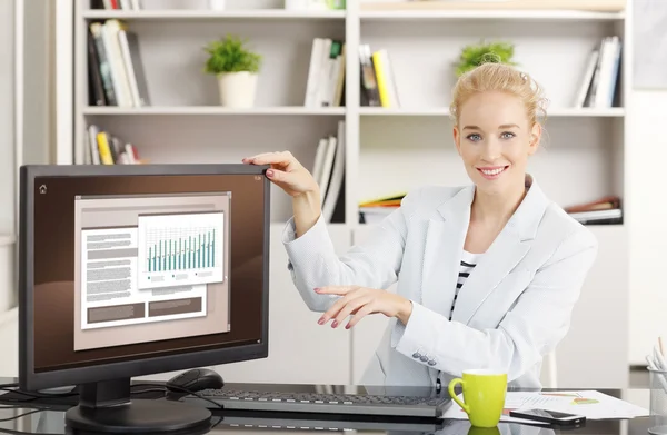 Estate agent sitting at office — Stock Photo, Image