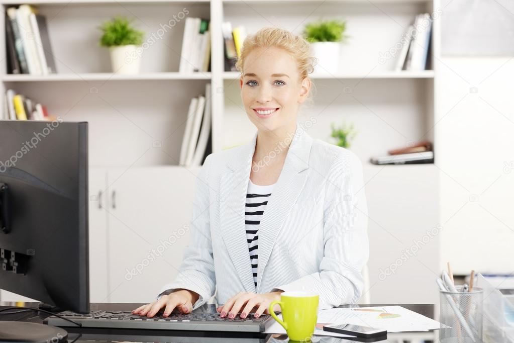 Businesswoman writing business presentation