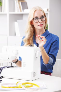 Professional designer working at fashion studio