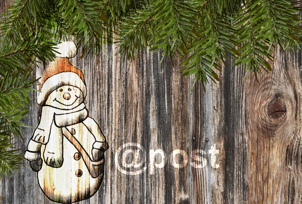 Tło Boże Narodzenie bałwan na drewno — Zdjęcie stockowe