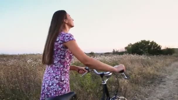 Girl with a bicycle — Stock Video