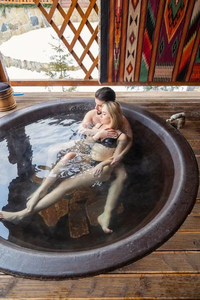 Young couple bathing in a vat — Stock Photo, Image