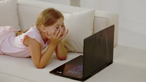 Girl looking at laptop — Stock Video