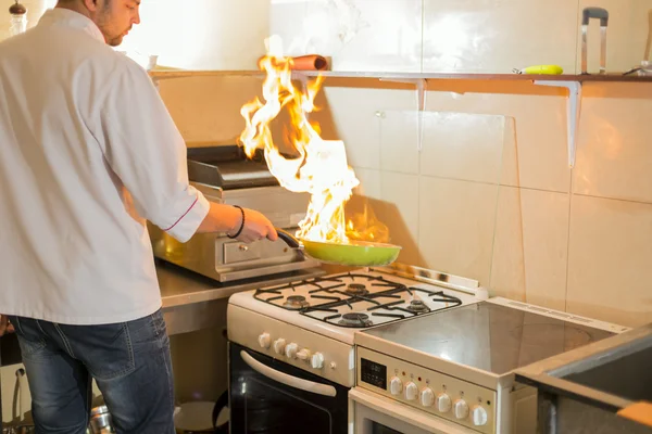 Fire in a frying pan — Stock Photo, Image