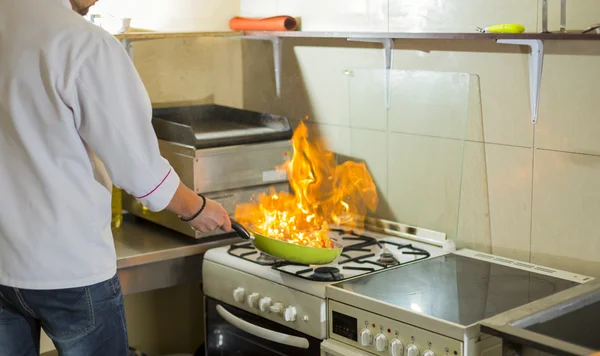 Fire in a frying pan — Stock Photo, Image