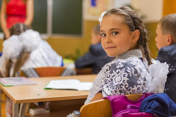 Pupil at a school desk — Stock Photo, Image