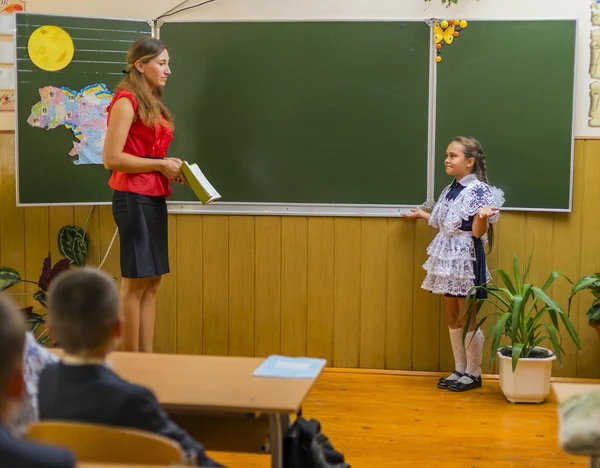 Pupil and teacher — Stock Photo, Image