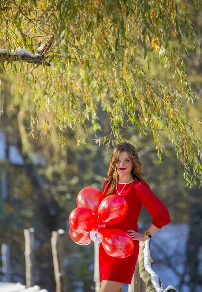 Jente med ballonger – stockfoto