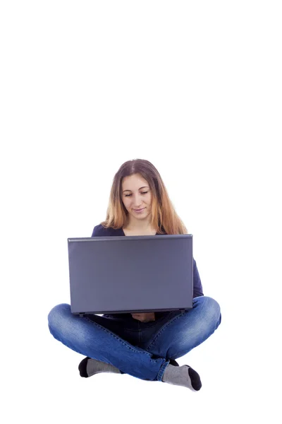 Chica con un ordenador portátil — Foto de Stock