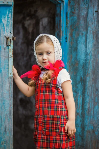 Girl in red dress — Stock Photo, Image