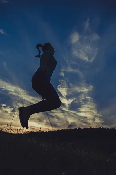 Dívka se skákacím lanem — Stock fotografie