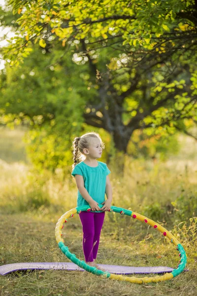 Girl with hoop — Stock Photo, Image