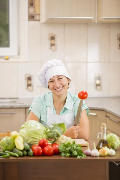 Girl chef and knife — Stock Photo, Image