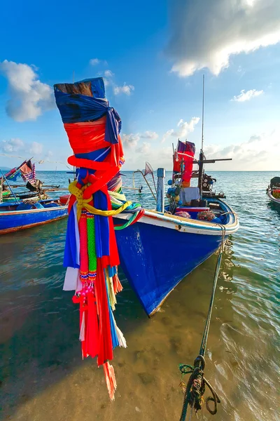 Blue boat, ribbon, sea — Stock Photo, Image