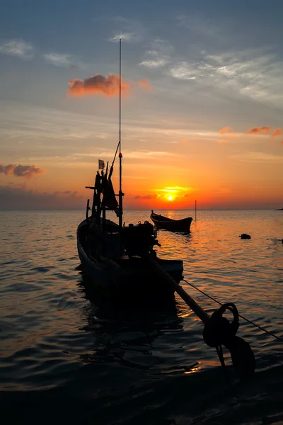 Sea sunset, silhouette of boats — Stock Photo, Image