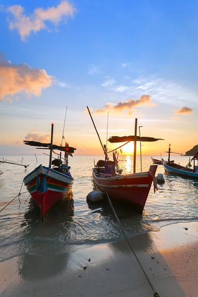 Sunset, wooden boats — стокове фото