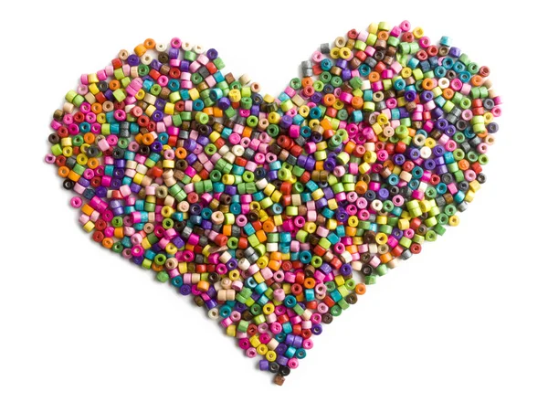 Colorful wooden beads heart — Stock Photo, Image