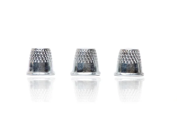 Three silver thimbles — Stock Photo, Image