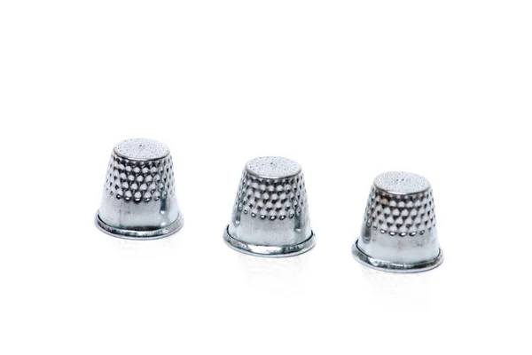 Three silver thimbles — Stock Photo, Image