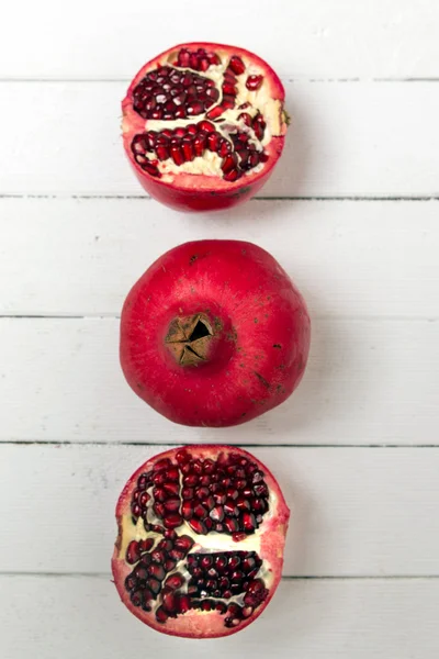 Fresh pomegranate fruits on white — Stock Photo, Image