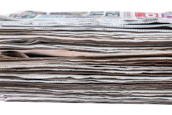 Stacked pile of newspapers — Stock Photo, Image