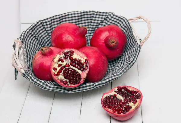 Fresh pomegranate fruits on white — Stock Photo, Image