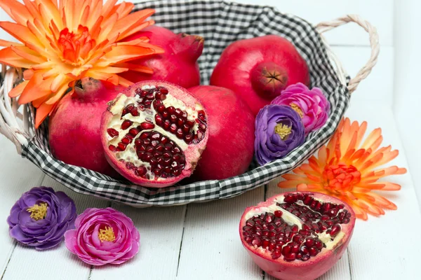 Fresh pomegranate fruits on white — Stock Photo, Image