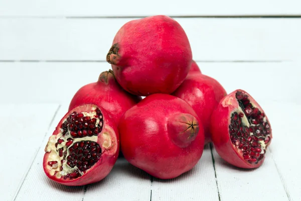 Fresh pomegranate fruits on white — Stock Photo, Image