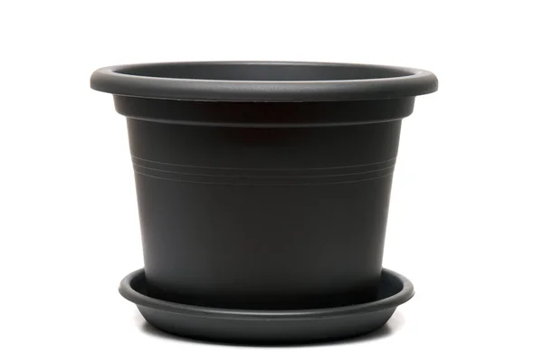 Пустой черный пластиковый цветочный горшок — стоковое фото