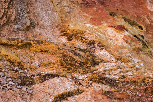 Rock texture with deposits of sulfur — Stock Photo, Image